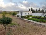 A vendre une propriété clôturée de