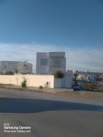 A vendre terrain habituel ou bien commercial