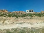 Un lots de terrain a menchar a vendre