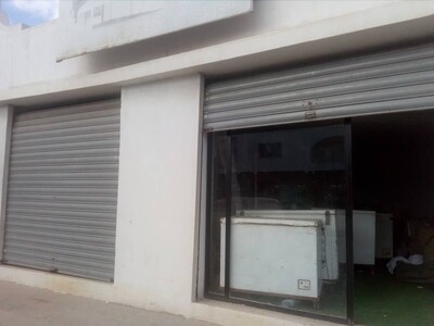 deux garage commercial sur terrain de 100m²