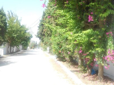 a plot in a quiet and residential area +.
