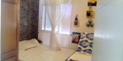 un appartement dans une résidence gardée av