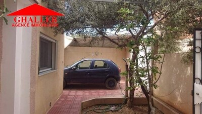 une maison avec jardin abri de voiture a besbassia g