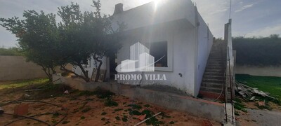 une maison inachevée proche de tout les commodités