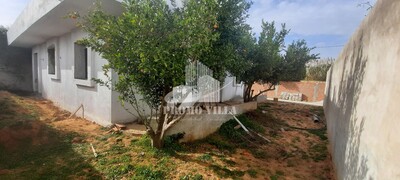 une maison inachevée proche de tou les commodités à hammamet