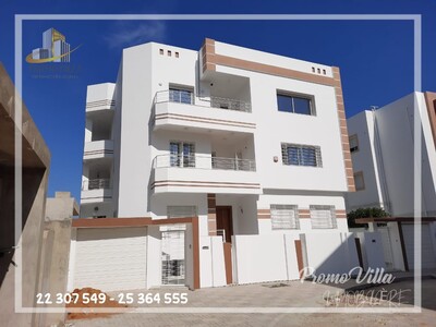 A vendre une immeuble R+2 avec sous sol