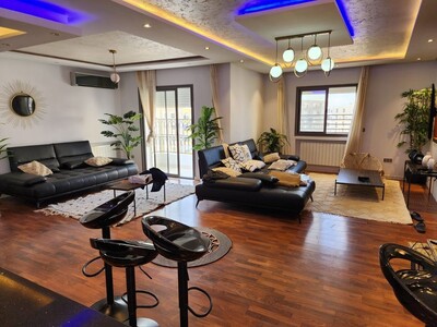 a vendre un appartement avec un place parking