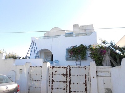 Villa imposante située dans une zone touristique