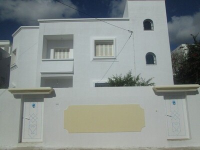 AL Appartement au RDC en face rond point sultan