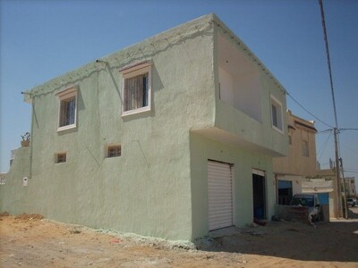 َA la ceinture de zone Craxi AV maison avec 2 garages