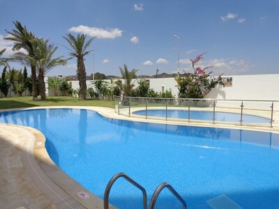av appartement dans une résidence neuve et avec piscine