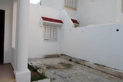 belle villa plein pieds avec jardin dans un quartier résidentiel