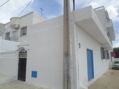 AV une maison garage proche hammamet