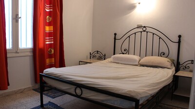 AL apprt avec jardin et place parking