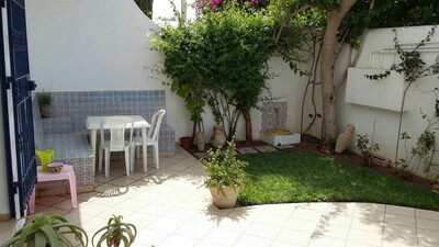 un joli appartement avec jardin