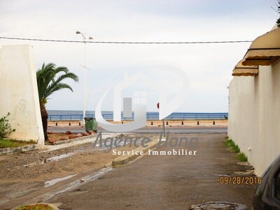 Terrain R+2 pieds dans l'eau