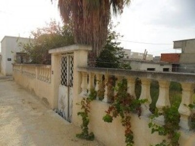 A Vendre Un Terrain de 500 m2 avec Studio