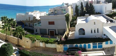 GROUND floor of a villa 30 mtrs off the beach