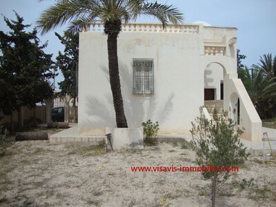 VISAVIS IMMOBILIER:PROPRIETE A DJERBA:VENTE:TRES CHARMANTE VILLA AU ZONE TOURISTIQUE
