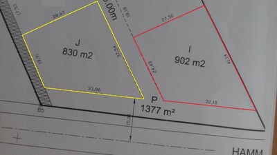 Terrain 902m avec façade commerciale à Sidi Hammed
