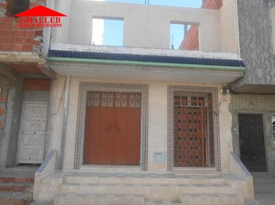 AV à nabeul centre un maison RDC EM