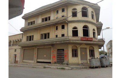 un immeuble à grambalia 410 md