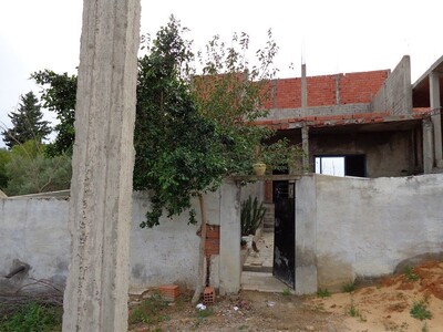 a vendre une maison inachevé de 103m² à birbourgba