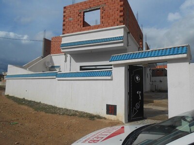 maison rc avec garage et étage inachevée