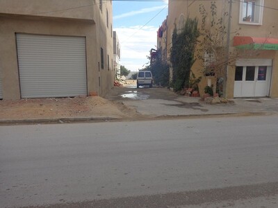 a v UN terrain de 125m²