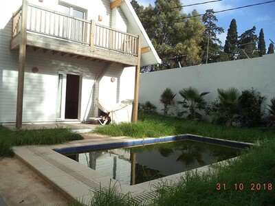 Villa le golf un chalet avec piscine