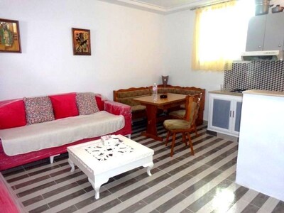 un appartement au RDC avec piscine et jardin a vendre