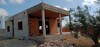 Maison inachevé de 300m terrain