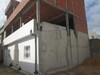 un affaire maison plus 2 étages inachevés
