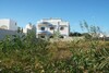 Terrain en face la zone touristique