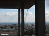 AV une maison avec étage inachevé avec vue de mer
