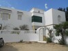 a large impressive villa in a residential area
