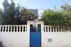 Av une maison situé dans une zone populaire 75MD