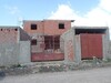 AV maison inachevée avec trois garage