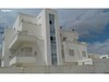building of 3 appartementements and a studio for sale