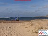 Lot de terrain a la mer de 700 avec titre bleu