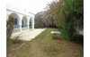 un bungalow front dans la mer OO