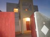 av une maison de deux niveaux CH